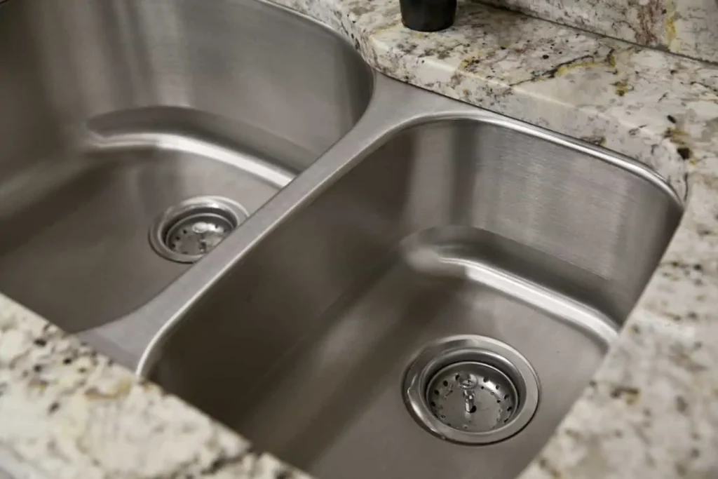 reasons for kitchen sink backing up